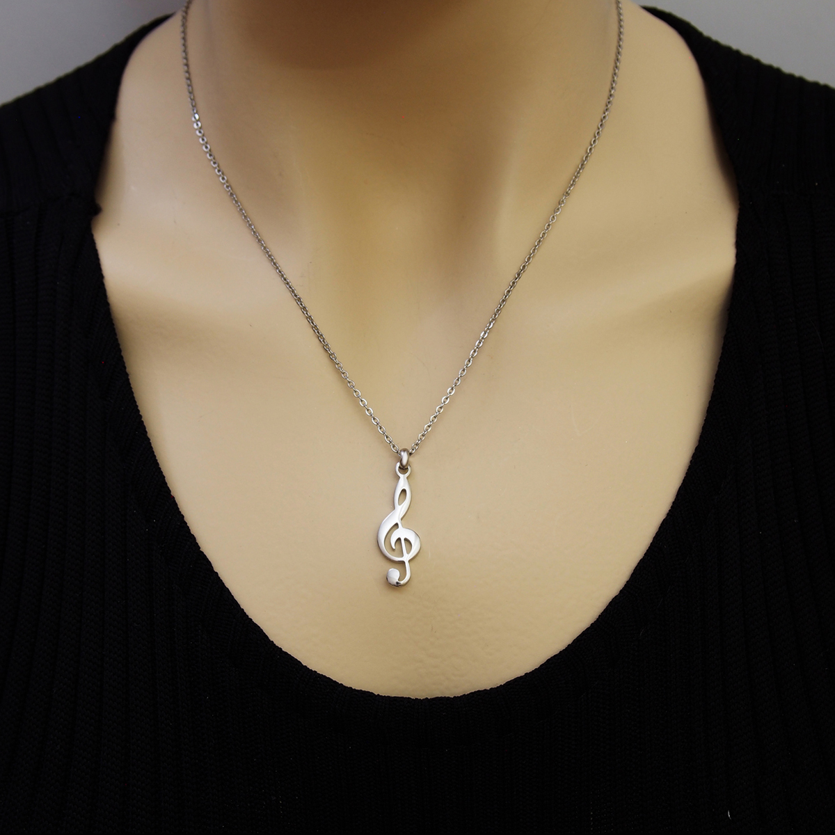 899Z Sol anahtarı müzik çelik kolye   (25x10mm) 